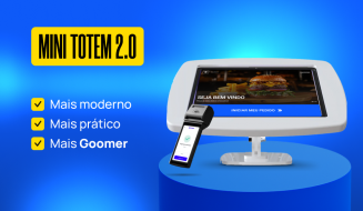 Imagem de um mini totem 2.0 moderno e prático, com tela touchscreen exibindo uma mensagem de boas-vindas, ideal para estabelecimentos comerciais que desejam uma solução tecnológica eficiente para atendimento ao cliente.