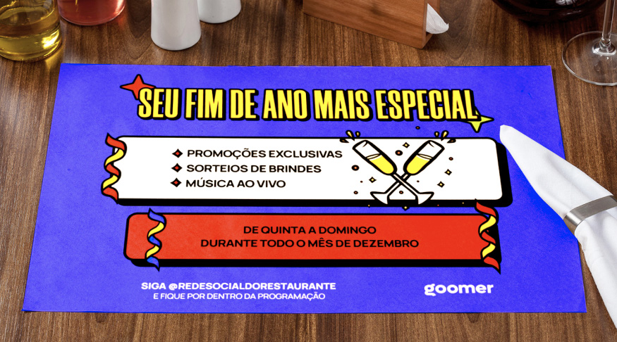 Jogo americano com design semelhante ao do tablet, destacando a campanha de fim de ano com promoções, sorteios e música ao vivo, voltado para divulgação offline em mesas de restaurante.